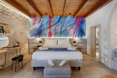 Letto o letti in una camera di Dimora Bonafede Ibla Design Rooms