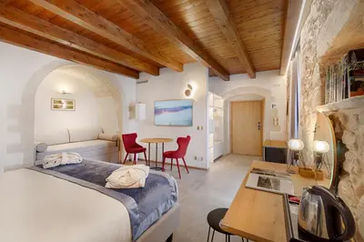 Letto o letti in una camera di Dimora Bonafede Ibla Design Rooms