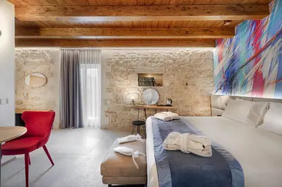 Letto o letti in una camera di Dimora Bonafede Ibla Design Rooms