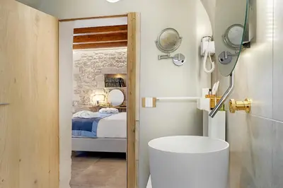 Letto o letti in una camera di Dimora Bonafede Ibla Design Rooms
