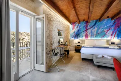 Letto o letti in una camera di Dimora Bonafede Ibla Design Rooms