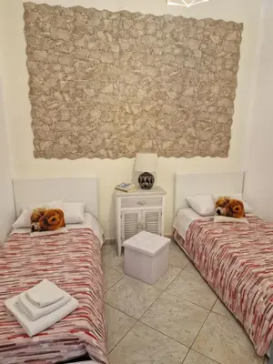 Letto o letti in una camera di Residenza Giuseppina