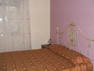 Letto o letti in una camera di Residence Cuba alloggi per turismo