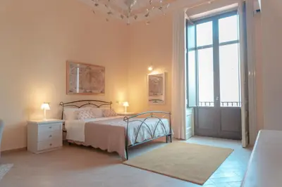 Letto o letti in una camera di Sicily in Home Centro Catania Pescheria