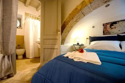 Letto o letti in una camera di Casa Clio