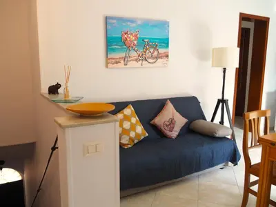 Area soggiorno di Muscaloru Rooms