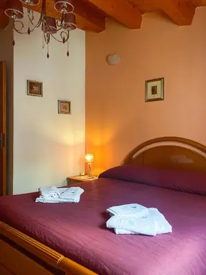 Letto o letti in una camera di BLU HOME TRINACRIA