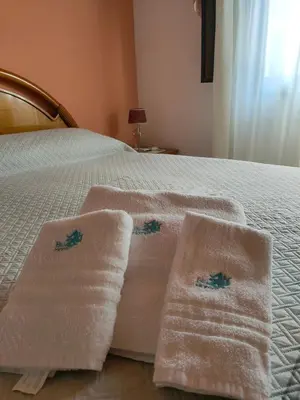 Letto o letti in una camera di BLU HOME TRINACRIA