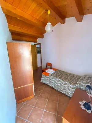 Letto o letti in una camera di BLU HOME TRINACRIA
