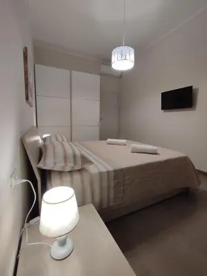 Letto o letti in una camera di Casa Violetta