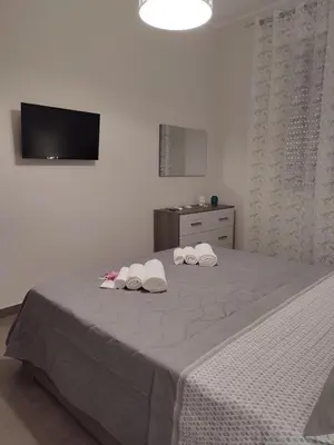 Letto o letti in una camera di Casa Violetta