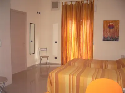 Letto o letti in una camera di B&B del centro storico ***