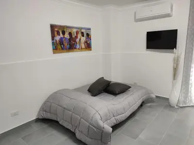 Letto o letti in una camera di Maya's Home