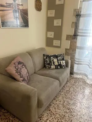 Area soggiorno di Ragusa exclusive flat with terrace & BBQ