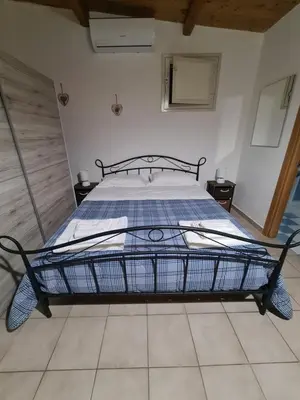 Letto o letti in una camera di Delfino Azzurro - Noto Marina - relax e tranquillità al mare
