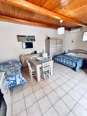 Letto o letti in una camera di Delfino Azzurro - Noto Marina - relax e tranquillità al mare