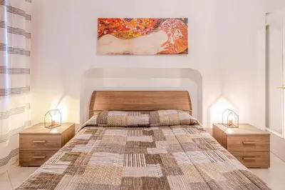 Letto o letti in una camera di OIKIA SEA