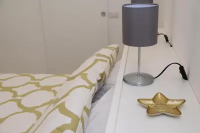 Letto o letti in una camera di Casetta Verga Loft