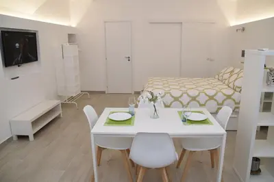 Area soggiorno di Casetta Verga Loft
