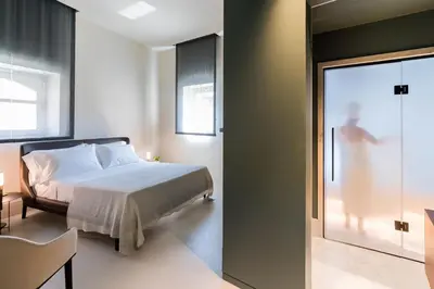 Letto o letti in una camera di Byssus Suites