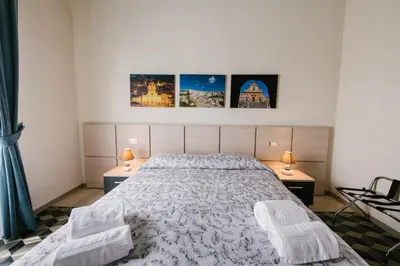 Letto o letti in una camera di Le Camere dei Conti