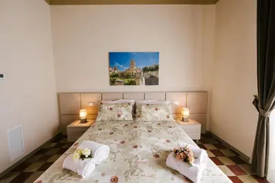 Letto o letti in una camera di Le Camere dei Conti