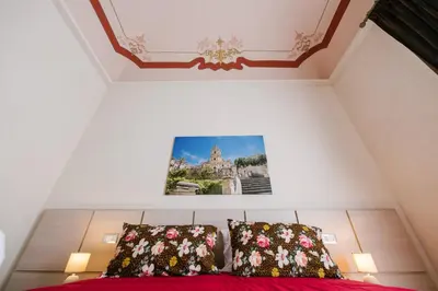 Letto o letti in una camera di Le Camere dei Conti