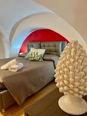 Letto o letti in una camera di Aitnè - Holiday Apartments