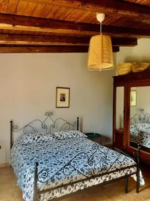 Letto o letti in una camera di Casa Magnolia