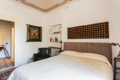 Letto o letti in una camera di Sicilianinsta Rooms