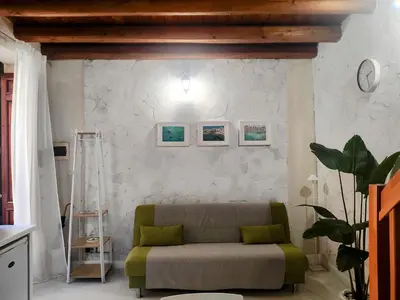 Area soggiorno di Casetta Stella - A due passi dall'isola di Ortigia