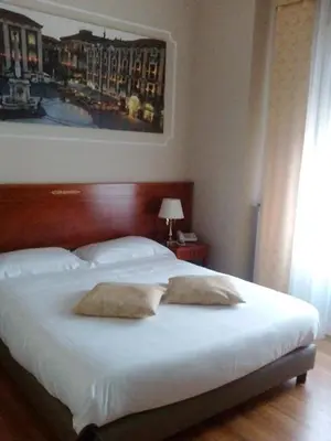 Letto o letti in una camera di Hotel Centrum