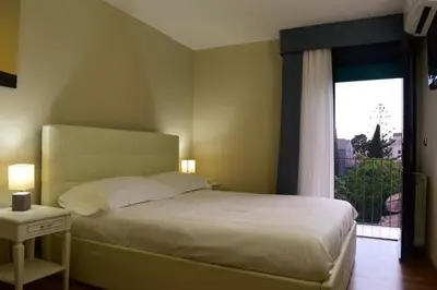 Letto o letti in una camera di Hotel Centrum