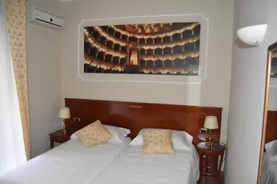 Letto o letti in una camera di Hotel Centrum