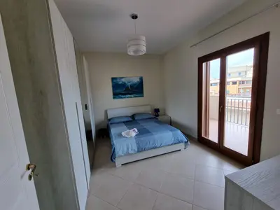 Letto o letti in una camera di Terrazza Dea Calypso