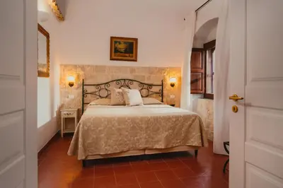 Letto o letti in una camera di Hotel Villa Giulia