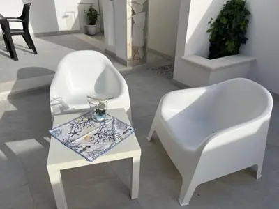 Area soggiorno di Holiday Rooms Ninfa