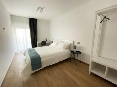 Letto o letti in una camera di Casa Giulia