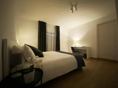 Letto o letti in una camera di Casa Giulia