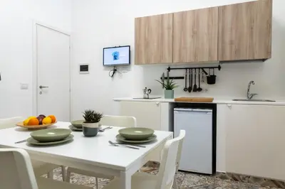 Cucina o angolo cottura di GuestHost - Via Malta Cozy Apartments near Ortigia