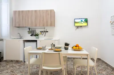 Cucina o angolo cottura di GuestHost - Via Malta Cozy Apartments near Ortigia