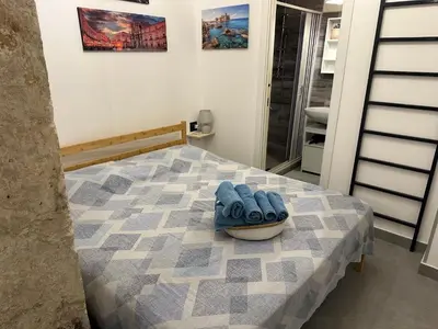 Letto o letti in una camera di Nesea Home
