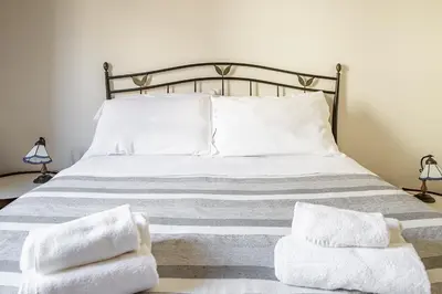 Letto o letti in una camera di Duplex sul porto grande by Wonderful Italy