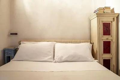 Letto o letti in una camera di Casa Gelsomino by Wonderful Italy