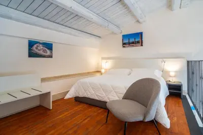 Letto o letti in una camera di Borgo Vita Novella Resort