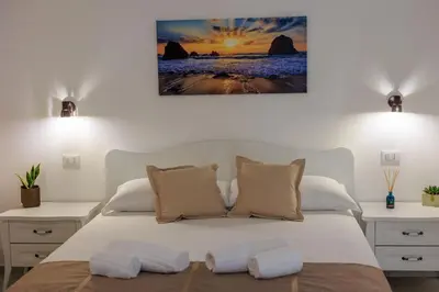 Letto o letti in una camera di Miramare rooms b&b