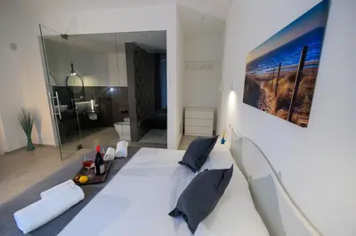 Letto o letti in una camera di Miramare rooms b&b