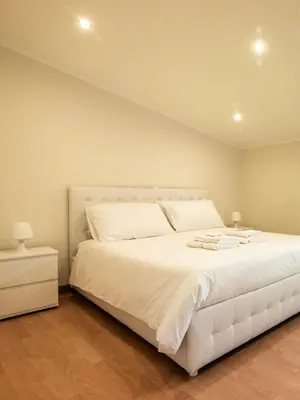 Letto o letti in una camera di Villa Ramadia