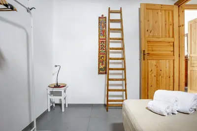 Letto o letti in una camera di Casa Keller con Terrazza by Wonderful Italy