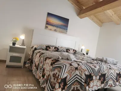Letto o letti in una camera di Il Giardino in centro